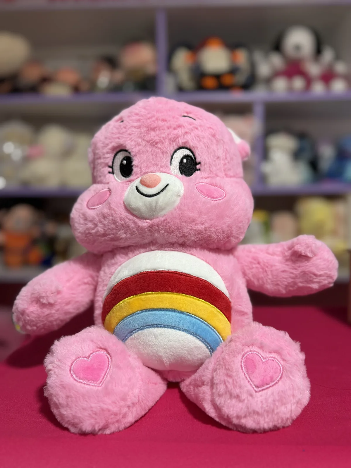 PELUCHE OSITA CARIÑOSITO ARCOÍRIS 29x19 ROSADO - foto principal